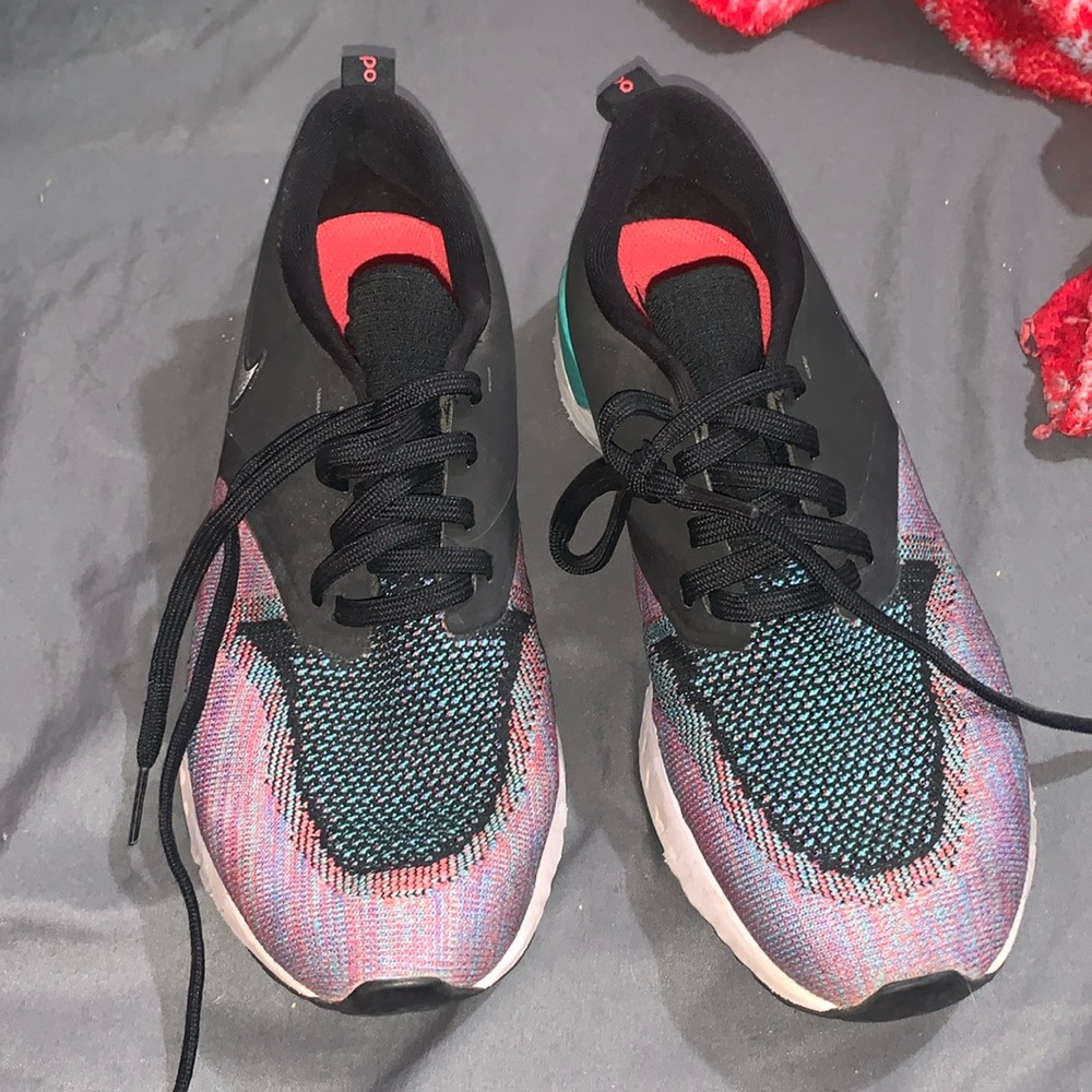 Like-new slip on Nike running shoes, size 10